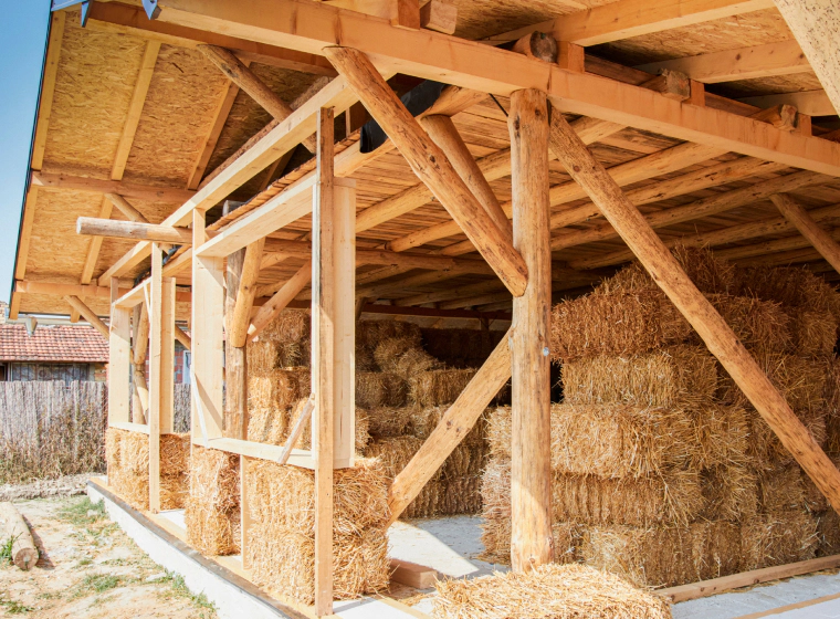 straw bale house built for storing straw bales